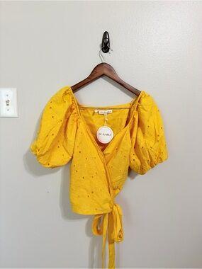 AVAILABLE Yellow Eyelet Puff Sleeve Wrap Top